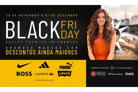 Entrada do Outlet Premium Imigrantes decorada para a Black Friday, destacando grandes marcas e descontos